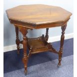 EDWARDIAN WALNUT OCTAGONAL CENTRE TABLE on turned and fluted baluster legs with saltire stretcher