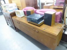 NATHAN, 1970's TEAK LONG LOW SIDEBOARD WITH THREE CENTRE DRAWERS AND END CUPBOARDS, 6' WIDE