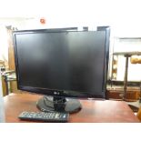 L.G. 22" FLAT SCREEN TELEVISION WITH REMOTE CONTROL