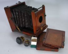 LEWIS, PALMER & LONGKING, AMERICAN 'NEVER BEHIND' MAHOGANY AND BRASS MOUNTED PLATE CAMERA with brass