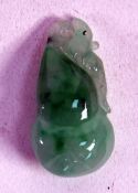 A CHINESE CARVED GREEN JADE GOURD SHAPE PENDANT
