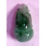 A CHINESE CARVED GREEN JADE GOURD SHAPE PENDANT