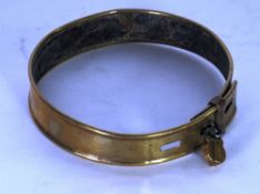 a 19TH CENTURY BRASS LEATHER LINED DOG'S COLLAR ENGRAVED 'HENRY ALLSTON, W BERGHOLT' with fully