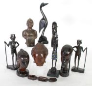 COLLECTION OF SEVEN AFRICAN CARVED WOOD FIGURES AND BUSTS, together with a far eastern BUST OF
