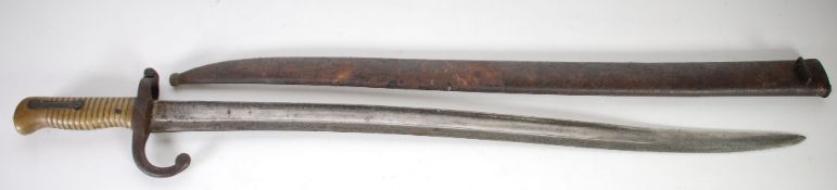 FRENCH 19th CENTURY SWORD BAYONET with curved single edge fullered blade, the back edge dated