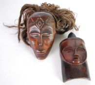 CHOKWE CARVED WOOD DANCE MASK, with scarification and natural fibre and raffia wig, 8" (20.3cm)