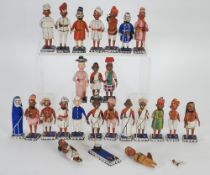 COLLECTION OF TWENTY FOUR INDIAN PAINTED BALSA? WOOD FIGURES on square chamfered bases, 31/2" (8.