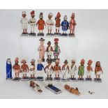 COLLECTION OF TWENTY FOUR INDIAN PAINTED BALSA? WOOD FIGURES on square chamfered bases, 31/2" (8.