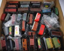 APPROX 75 UNBOXED ITEMS OF 'OO' SCALE GOODS ROLLING STOCK, various makers and including N.B.C.