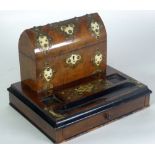 A VICTORIAN WALNUT DESK STAND with rear domed lidded superstructure the platform base with inkwell