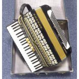 HOHNER VIRTUOLA III PIANO ACCORDION in black finish case with 120 bases and 5 treble couplers, (late