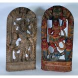 NEAR PAIR OF INDIAN CARVED AND PIERCED WOOD PANELS each of milestone form, carved in high relief