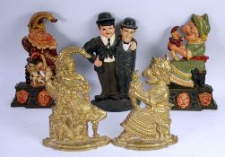 PAIR OF COLD PAINTED CAST METAL 'PUNCH' AND 'JUDY' DOOR STOPS, A SIMILAR GILT METAL PAIR and a