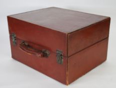 VINTAGE RED LEATHER CASE with wood lined interior, 9" (22.8cm) high, 15 1/2" x 12 3/4" (39.4 x 32.