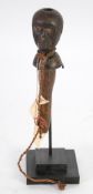 BAKUBA, ZAIRE CARVED WOOD WITCH DOCTORS HORN, modelled as a head with hole to the top, 9" (22.9cm)