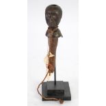 BAKUBA, ZAIRE CARVED WOOD WITCH DOCTORS HORN, modelled as a head with hole to the top, 9" (22.9cm)