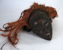 CHOKWE CARVED WOOD FEMALE DANCE MASK, with facial scarification and raffia and natural fibre wig, 8"