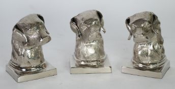 A PAIR AND ONE ODD MODERN WHITE METAL DOGS HEAD BOOK ENDS (3)