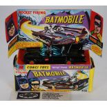 CORGI TOYS MINT AND BOXED "BATMOBILE" No 267 together with seven yellow rockets, stick on badges,