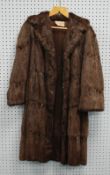 LADY'S BROWN MUSQUASH FULL LENGTH FUR COAT, with revered collar, double breasted hook fastening