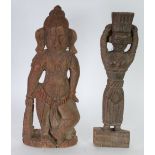 INDIAN CARVED WOOD FLAT-BACK FIGURE modelled standing, together with another, similar FIGURE