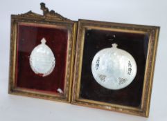 TWO 19th CENTURY CARVED MOTHER OF PEARL SHELLS in plush lined moulded gilt wood frames, both