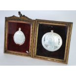 TWO 19th CENTURY CARVED MOTHER OF PEARL SHELLS in plush lined moulded gilt wood frames, both