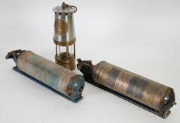 ECCLES JCM 1 BRASS AND WHITE METAL MINER'S SAFETY LAMP together with TWO BYGONE PORTABLE FIRE