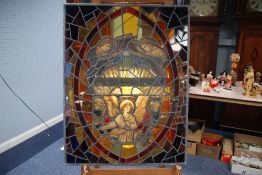 VICTORIAN PRE-RAPHAELITE LEADED AND STAINED GLASS PANEL depicting two angels looking down on the