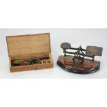 PAIR EARLY 20TH CENTURY APOTHECARIES STEEL AND BRASS PORTABLE SCALES in fitted box with set of
