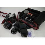CANON AF1 SLR CAMERA with selection of lenses, filters and a flash attachment