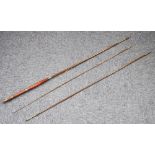 A THREE PIECE TROUT FISHING ROD, in canvas bag