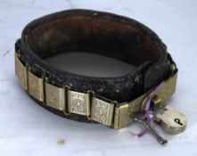 A LATE 19TH/EARLY 20TH CENTURY LEATHER AND ENGRAVED WHITE METAL DOG'S COLLAR INSCRIBED 'B.