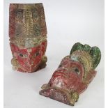 PAIR OF INDIAN CARVED AND PAINTED WOODEN HEADS, flat backed, probably originally finials or part