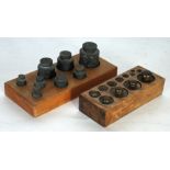 PART SET OF ELEVEN (OF TWELVE) BRASS CYLINDRICAL WEIGHTS, 2-50gms IN BLONDWOOD HOLDER AND A