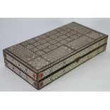 CAIRO WORK GAMES BOX of hinged oblong form, the interior set for backgammon, the exterior for chess,