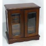 AN EDWARDIAN MAHOGANY SMOKERS CABINET