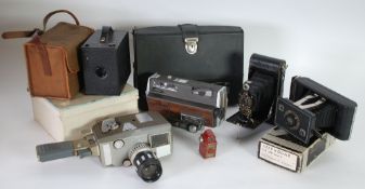 CORONET 'MIDGET' 16mm CAMERA WITH BLACK VEINED RED BAKELITE CASE (as found) together with a BELL &