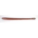 ABORIGINAL CARVED HARDWOOD WAR CLUB of rounded tapered form with simple fluted rustic decoration,