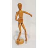 A MODERN MADE IN TAIWAN WOODEN ARTICULATED ARTIST'S LAY FIGURE