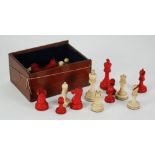 EARLY 20TH CENTURY CARVED NATURAL AND RED STAINED STAUNTON PATTERN CHESS SET complete the King 3" (