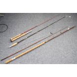 TWO MODERN FISHING RODS IN CANVAS BAGS (2)