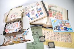 THE TRIUMPH STAMP ALBUM containing a, mainly early 20th Century, selection of mainly used world