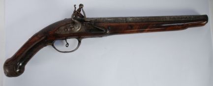 19th CENTURY MIDDLE EASTERN FLINT LOCK PISTOL with figured wood full stock with 9 3/4" (24.8 cm)