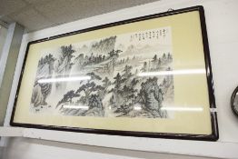 A LARGE ORIENTAL PRINT IN BLACK FRAME