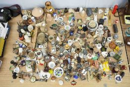A LARGE COLLECTION OF MINIATURE TRAVEL SOUVENIRS