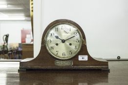 A MAHOGANY NAPOLEONS HAT SHAPED MANTEL CLOCK