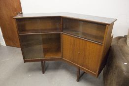 A TEAK 'TURNIDGE' CORNER BAR WITH SLIDING GLASS DOORS