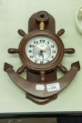 A WALL CLOCK IN WOODEN ANCHOR PATTERN CASE