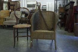A LLOYD LOOM ARMCHAIR, CANE SEATED SINGLE CHAIR AND TWO WALKING STICKS X 4